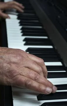 Dancing hands on the keyboard Photos