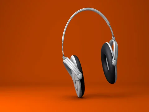 Dancing Headphones with an Orange Background Stock Footage 70761228