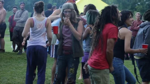 Dancing with hippie people Stock Footage 99994511