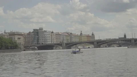 Dancing House Prague seen from Vltava River 4k Ungraded Raw  S-log Stock Footage 131874583