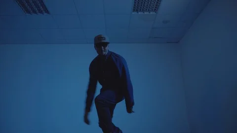 Dancing in interior on blue background 库存影片 119041925