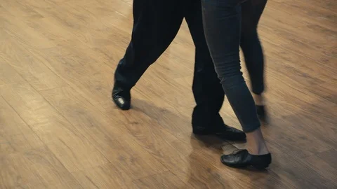 Dancing latin dance. Close-up of legs dancing tango. Stock Footage 124845469