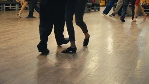 Dancing latin dance. Close-up of legs dancing tango. Stock Footage 124845729
