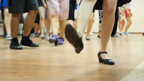 Dancing legs close-up. Dancers learning new moves. Woman teaching solo jazz Video stock 107209951
