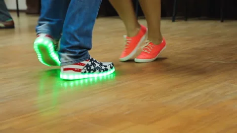 Dancing legs close up. Dancers perform boogie woogie dance at the swing festival Video stock 107210434