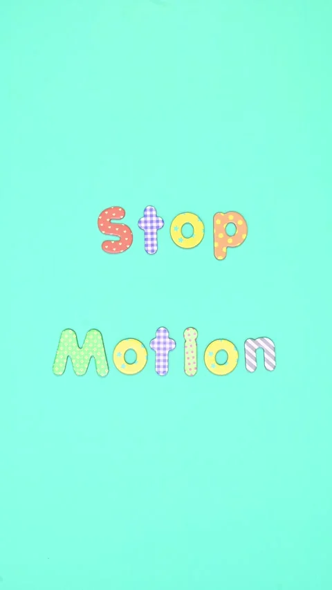 Dancing Letters Stop Motion on Vibrant Blue Background Stock Footage 313053666