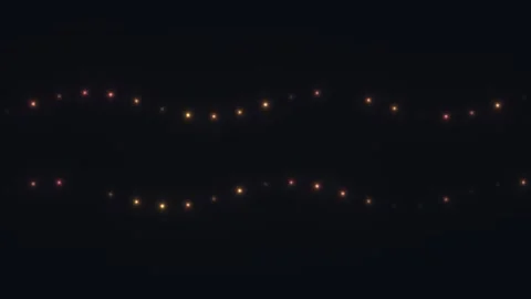 Dancing lights in darkness create a warm and inviting Stock Footage 338327781