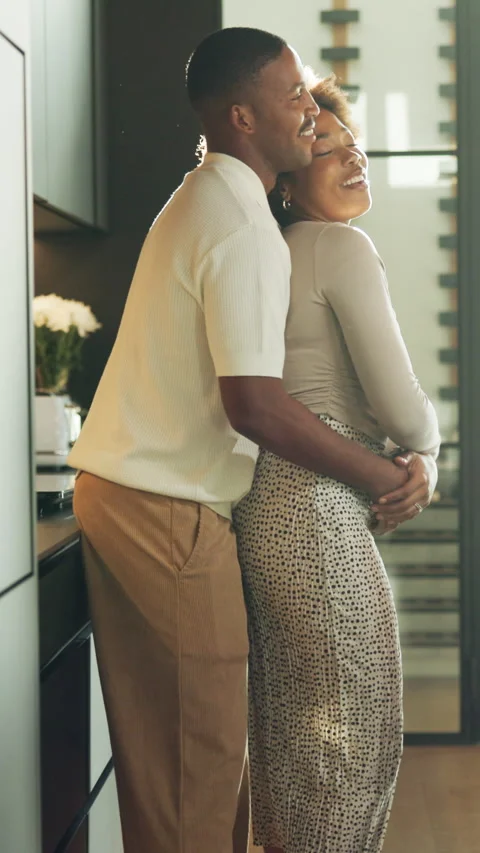 Dancing, love and couple in kitchen with embrace for bonding, connection and Stock Footage 340824257