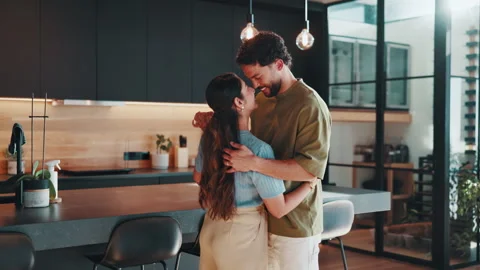 Dancing, love and couple in kitchen at house for bonding, happiness or marriage Stock Footage 344249662