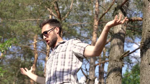 Dancing. A man is dancing in the forest. Stock Footage 158192710