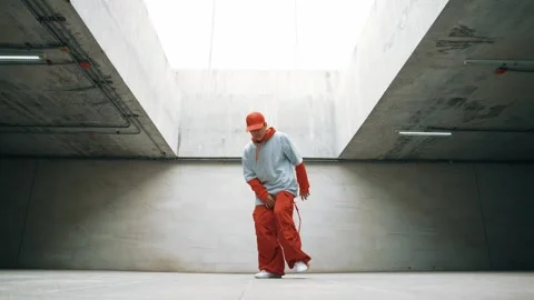 Dancing man enjoy practice break dance or freestyle in building. Sprightly. Stock-Footage 263717234
