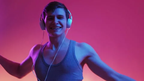 Dancing man neon light portrait stereo sound Stock Footage 220926952