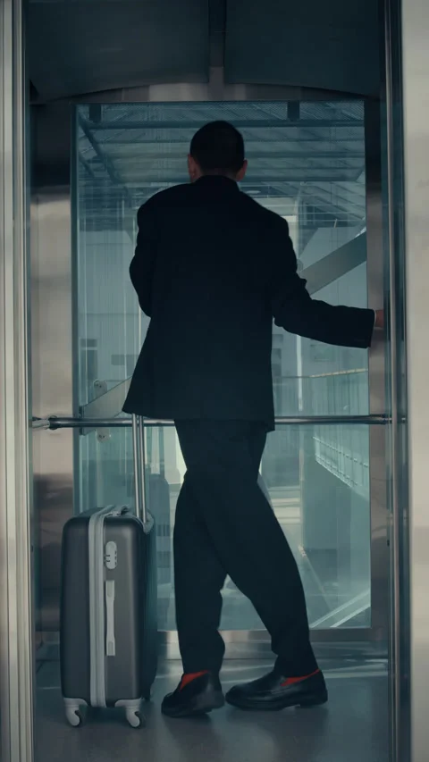 Dancing Man with Suitcase Making Solo Performance in Elevator Stock Footage 285832322