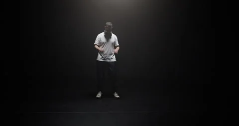 Dancing man taking off headphones Stock Footage 244523884