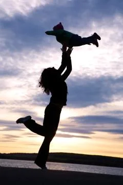 Dancing  mom with child Stock Photos