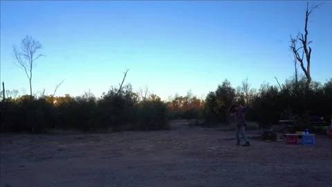 Dancing in nature with a bird and a camp fire - living the dream Stock Footage 316183075