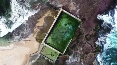 Dancing Over the Mona Vale Rock Pool Stock Footage 112468384