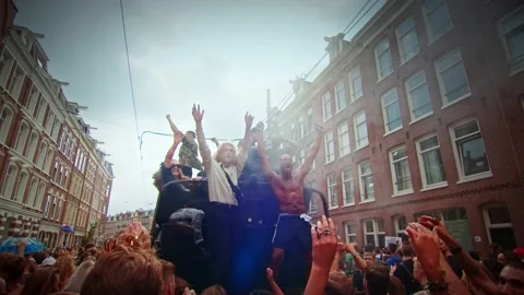 Dancing people on truck while protesting against corona in busy street Stock Footage 160899841