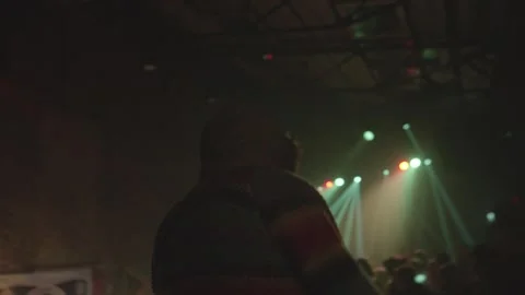 Dancing person from behind swaying back and forth Stock-Footage 248171984