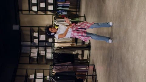 Dancing queen on a vertical plan for Instagram reels, a woman dances in a Stock Footage 262135596