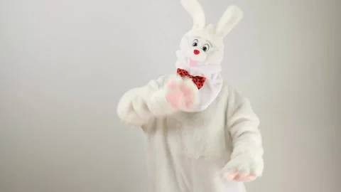 Dancing rabbit. A man in a white rabbit costume. Stock Footage 240865190