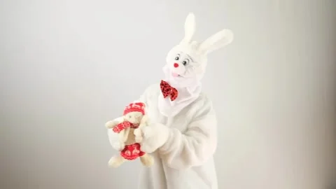 Dancing rabbit. A man in a white rabbit costume. Stock Footage 240865191