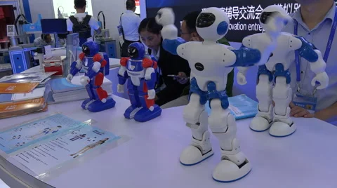 A dancing robot on display at a trade fair in Shenzhen, China Stock Footage 61270477