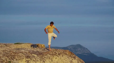 Dancing on a rock Stock Footage 33488555
