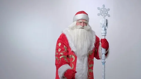 Dancing santa is pointing at copyspace and smiling Stock Footage 123415265