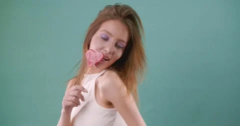 Dancing sensually and being playful with her hair Stock Footage 170239968
