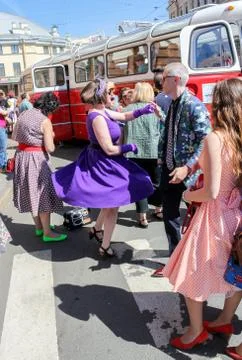 Dancing show group at the bus. Stock Photos