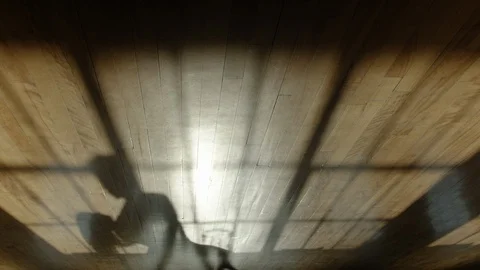 Dancing silhouaits on the wooden flore Video stock 128917872