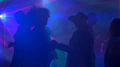 Dancing silhouette of a young couple in a costume ball Stock Footage 71007140