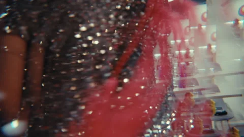 Dancing in a Silver Sequin Dress Stock Footage 335429092