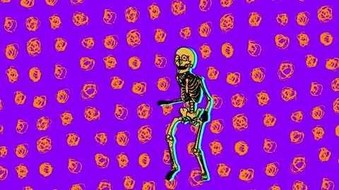 Dancing skeleton in comic style, fluorescent textures and patterns. Halloween Video stock 140747179