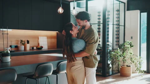 Dancing, smile and couple in kitchen at house for bonding, connection or Stock Footage 344249629