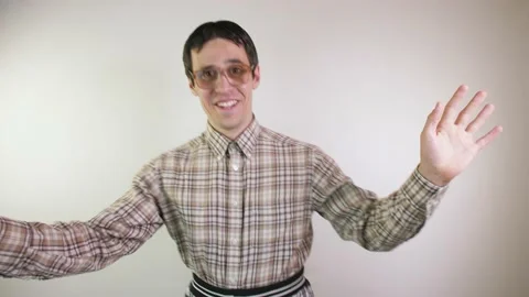 Dancing smiling nerd in glasses Stock Footage 130535774