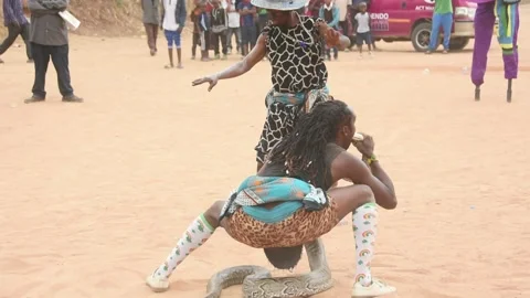 Dancing with a snake Stock Footage 306871544