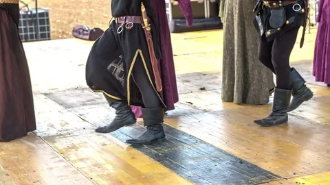 Dancing a traditional medieval dance on stage Vídeos de archivo 70048733