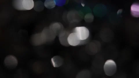 Dancing twinkling lights shining in the darkness Video stock 318580662