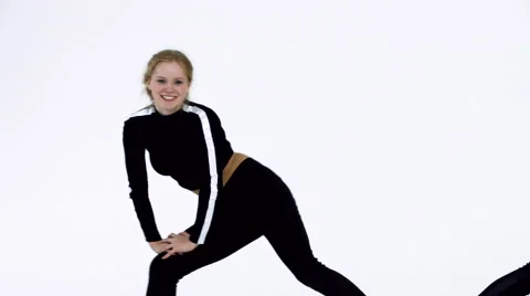 Dancing two girls on a white background in studio. 4K 30fps ProRes (HQ) Video stock 66909853