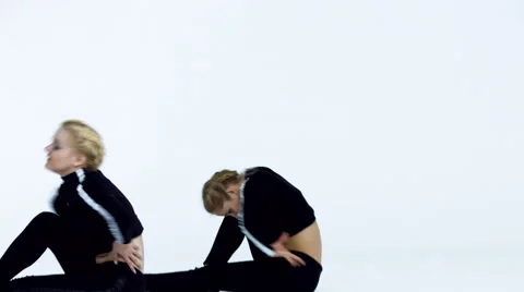 Dancing two girls on a white background in studio Video stock 66910290