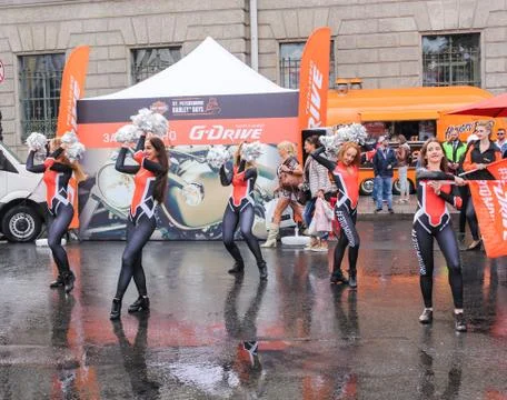 Dancing on wet asphalt. Stock Photos