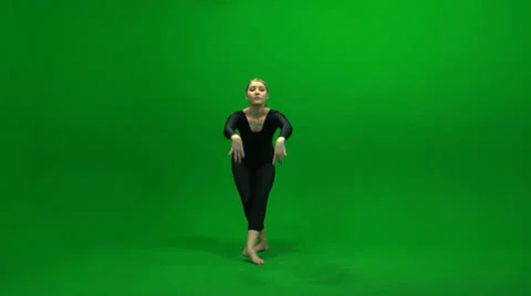 Dancing woman against green screen Stock Footage 22989148
