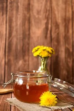 Dandelion jam in a glass jar. The concept of health. Life without cholesterol Stock Photos