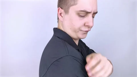 Dandruff on a man's shoulder. Side view of a man who has more dandruff flakes on Stock Footage 149733073