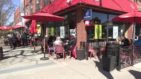 The Danforth Greektown in Toronto Canada on a nice sunny day Stock Footage 150773739
