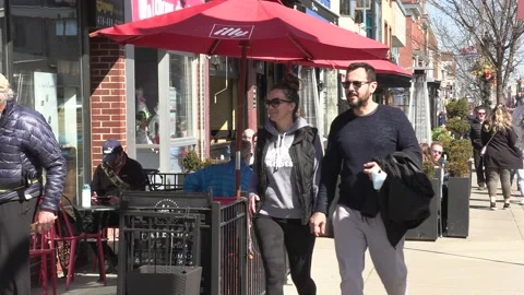The Danforth Greektown in Toronto Canada on a nice sunny day Stock Footage 150774147