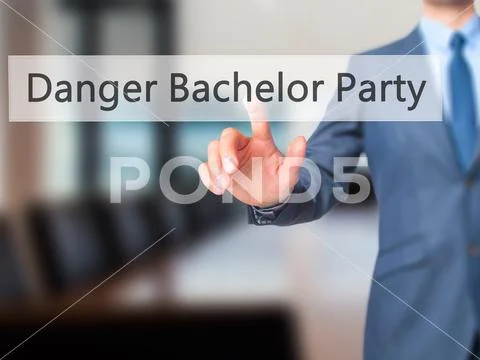 Danger Bachelor Party - Businessman hand pressing button on touc Stock Photos