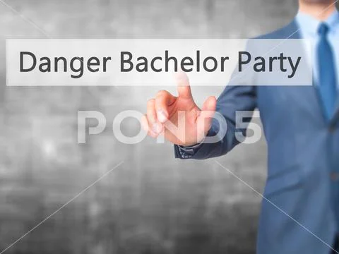 Danger Bachelor Party - Businessman hand pressing button on touc Stock Photos